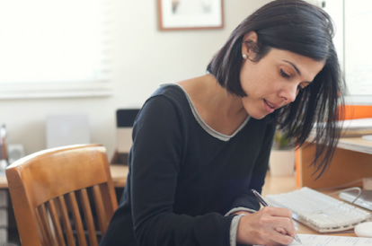 A woman taking notes 